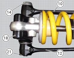 Disassembly of rear shock absorber - rocker arm - linkage assembly