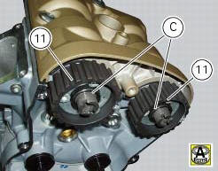 Refitting the cylinder heads pulleys/fixed tensioners