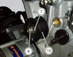 Refitting the cylinder heads pulleys/fixed tensioners