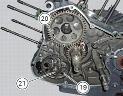 Removal of the starter motor idler gear