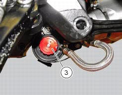 Adjusting the rear shock absorber